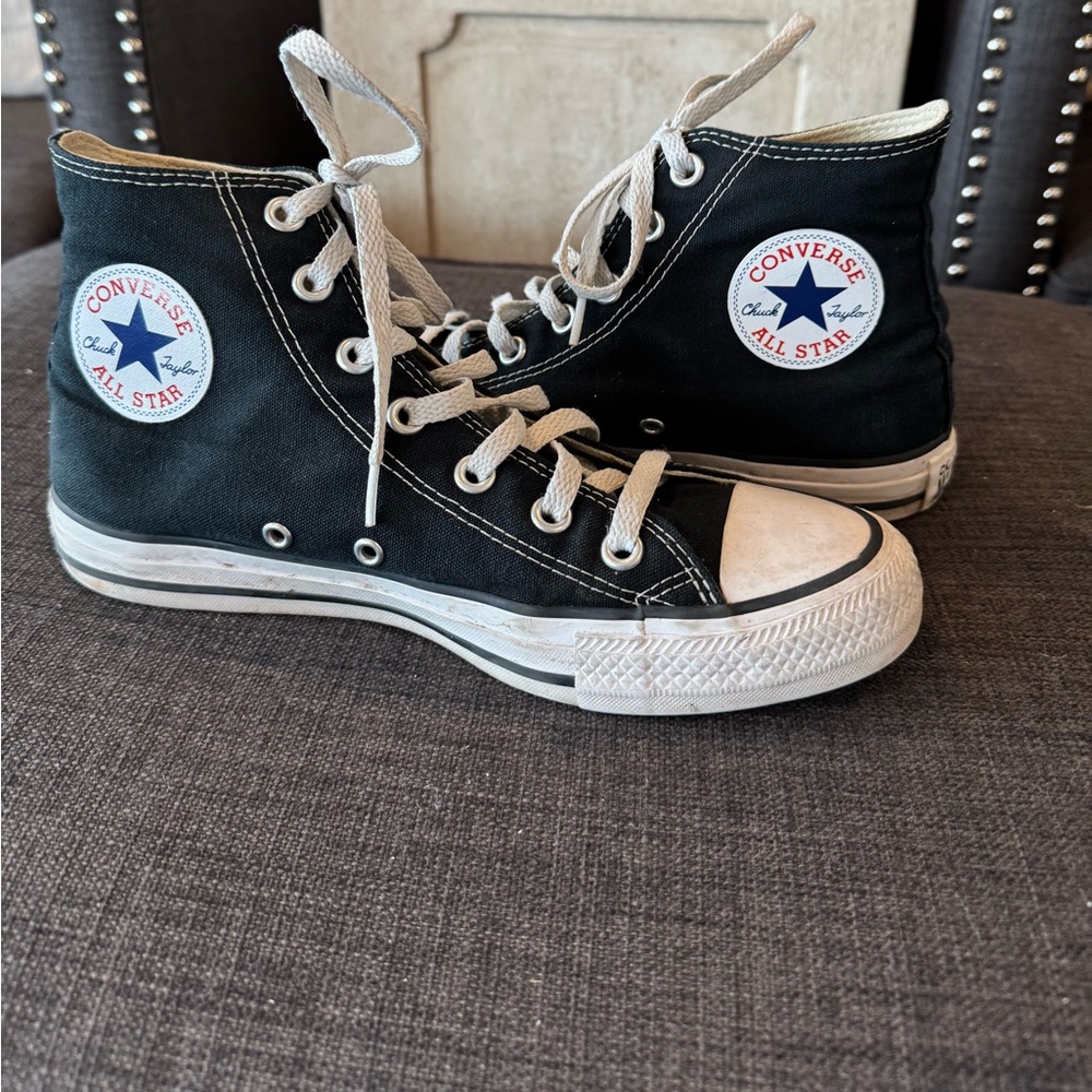 Very gently used black Chuck Taylor size 8 women .